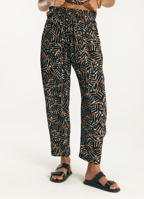 Calça crepe estampada caminos