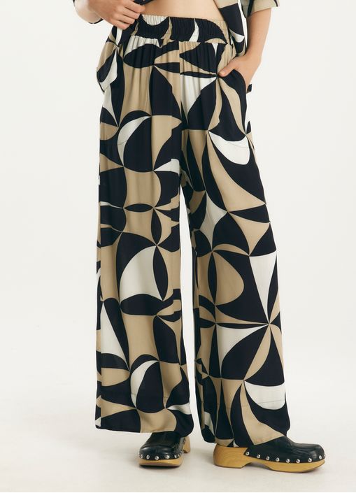 Calça estampada tendas