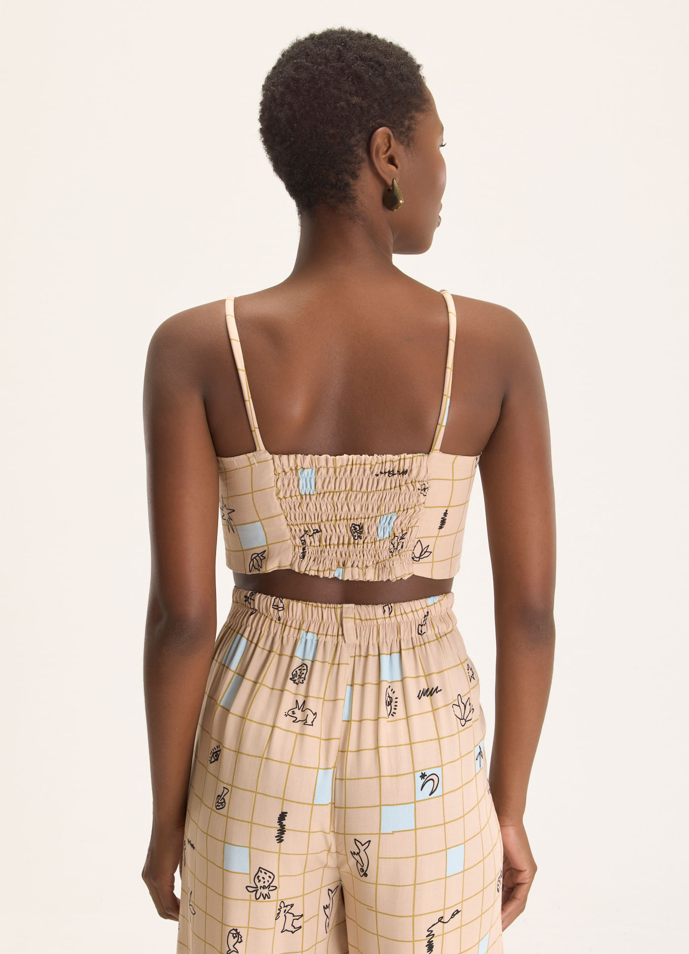 Top estampado riscada