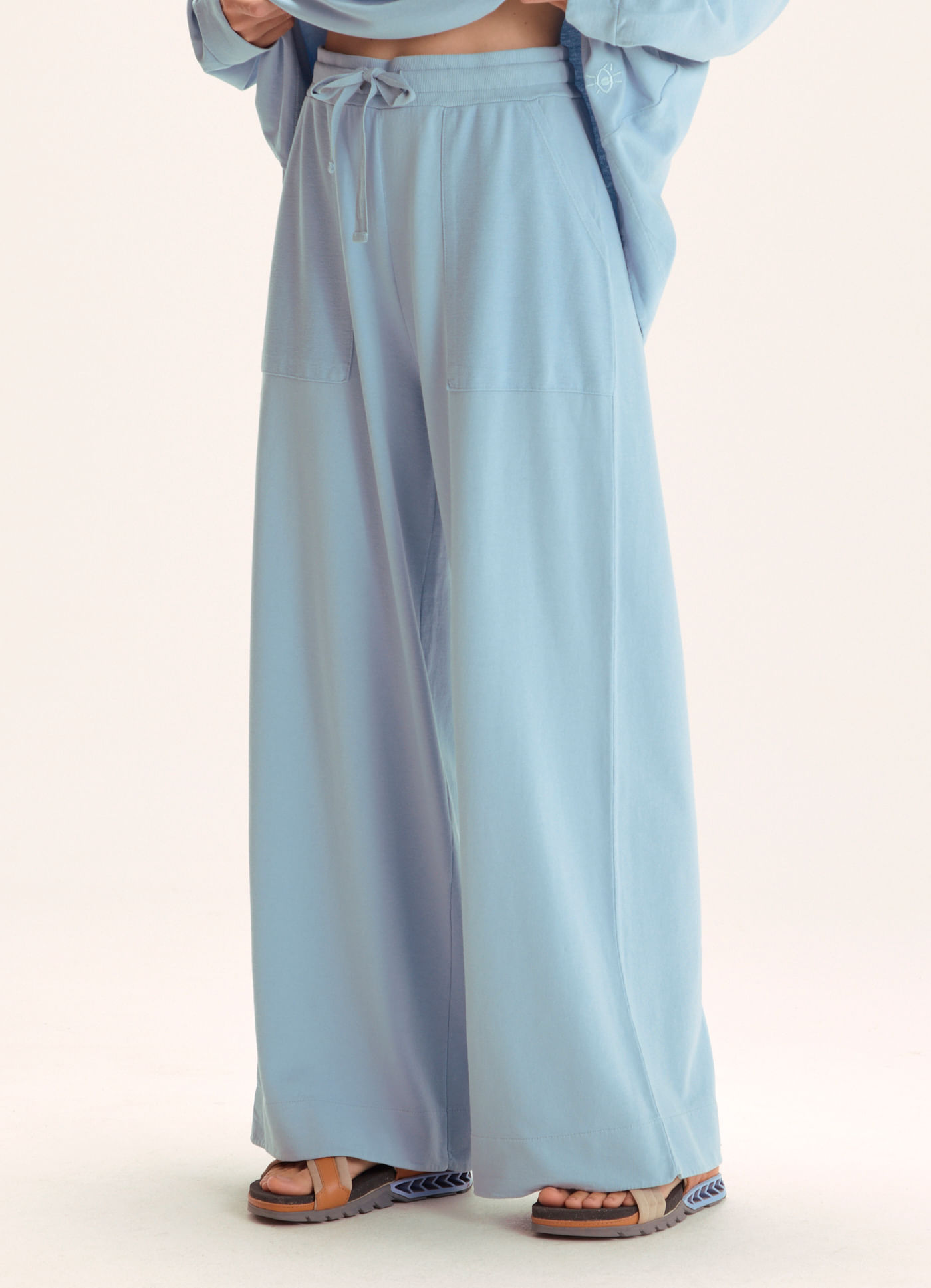 Calca moletinho bolso avesso azul claro