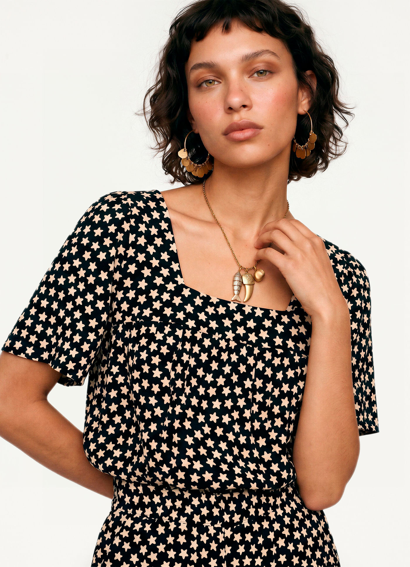 Blusa manga estampada estelar